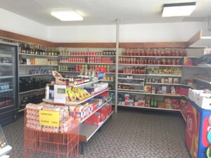 photo of a convenience store selling beverages and ice cream